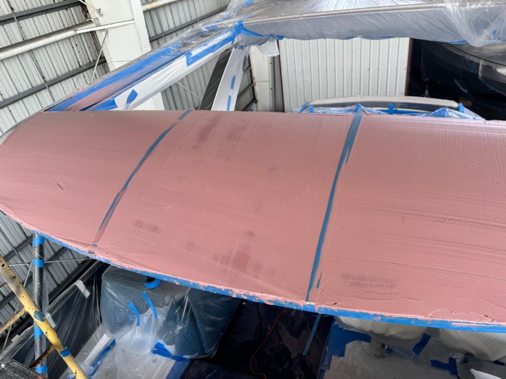 Yacht hardtop faired with compound before primer and paint